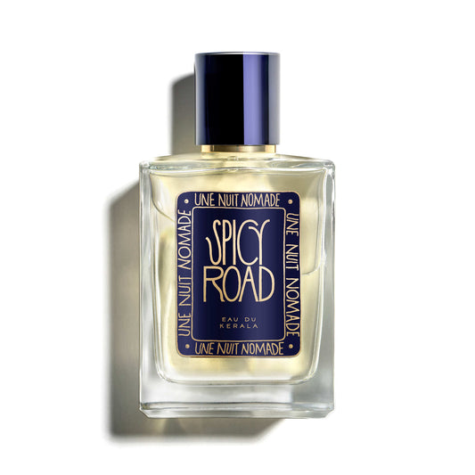 Perfume bottle labeled 'Spicy Road' by 'Une Nuit Nomade' on a white background