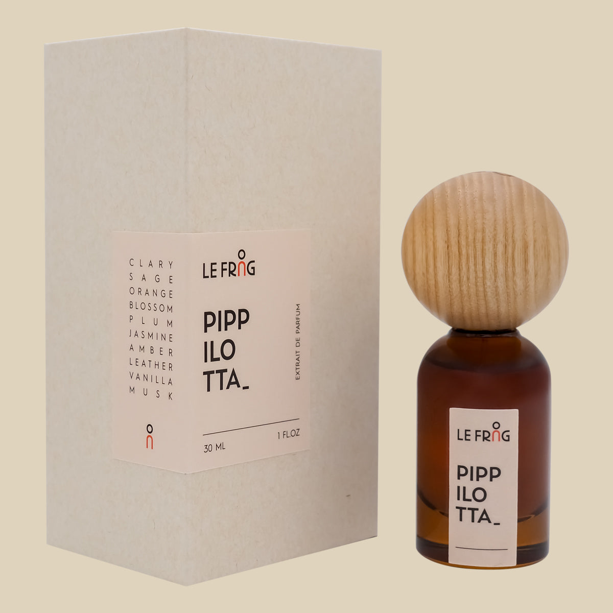 Le Frag Pippilota perfume bottle with wooden cap and packaging on a beige background